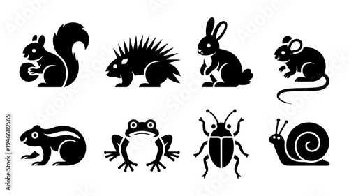 A charming collection of eight dark flat animal icons from diverse natural habitats.