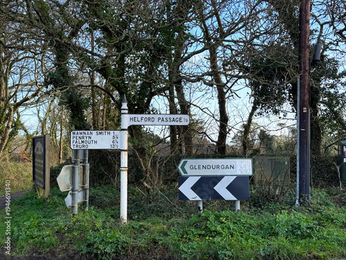 Direction signs at Helford Passage on a sunny winter day. Photo taken February 1st, 2026, Helford Passage, Cornwall, United Kingdom.