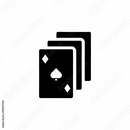 Three black playing cards stacked with spade symbol