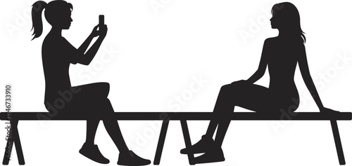 Two women silhouettes sitting on a bench one taking a with her phone people