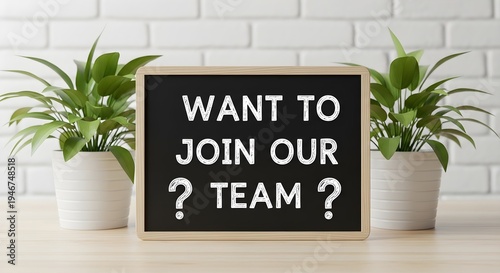 Business recruitment concept with 'Want to join our team' on chalkboard and plants