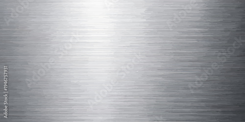 A polished silver stainless steel plate with a brushed metal texture creates a sleek industrial material background featuring a smooth metallic surface and subtle grey reflections on the aluminum shee