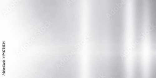 A polished stainless steel plate featuring a brushed metal texture with a shiny silver metallic surface and light grey reflection on a smooth aluminum backdrop sheet pattern