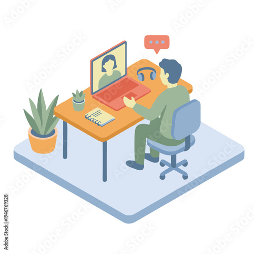 A man sits at a desk working on a laptop with a monitor and headset while a woman appears on screen in a remote communication setting.