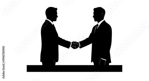 Businessmen shaking hands over a table, silhouette, agreement, partnership, success