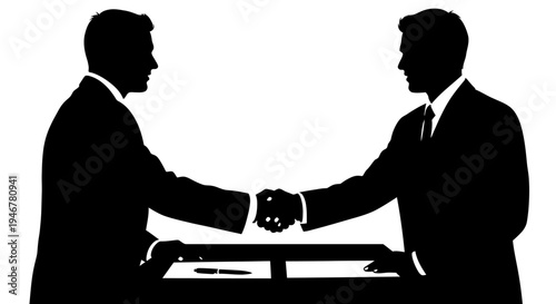 Businessmen shaking hands over a table, silhouette, agreement, partnership, success