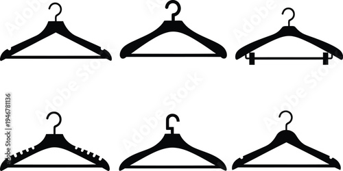 Collection of six black coat hangers on white background