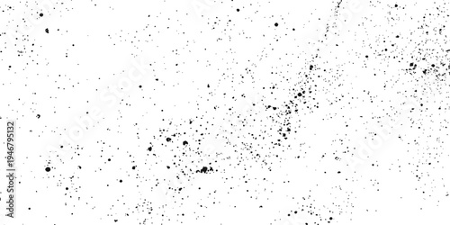 A grunge black and white wallpaper design featuring artistic ink paint splashes and liquid water drops on a wet glass texture with a dark pattern