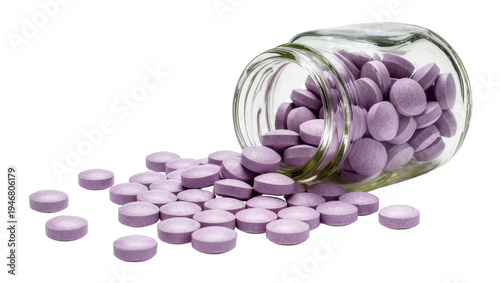 Foto Isolated purple pills spilling from a tipped-over glass jar, scattered medicatio
