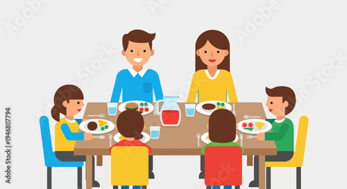 Family eating together at dinner table.