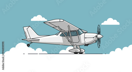 Small white airplane in flight.