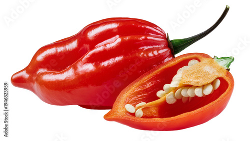 Photos Isolated vibrant red habanero chili pepper, one whole fresh fruit and one half with seeds