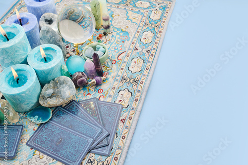 Divination tools with tarot cards and crystals for spirituality
