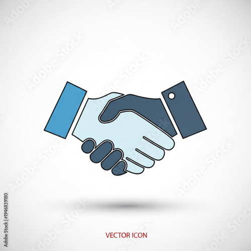Handshake between two people in business attire as a symbol of partnership and agreement