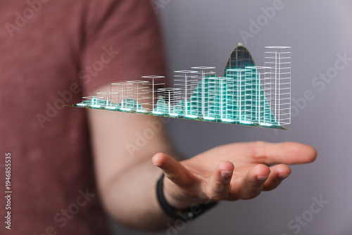Hand holding a futuristic d...