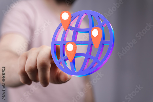 Hand touching a 3D globe wi...