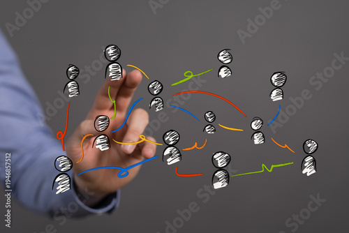 Hand pointing at a network ...