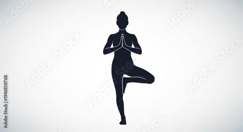 Silhouette of a woman in a yoga tree pose with hands together.