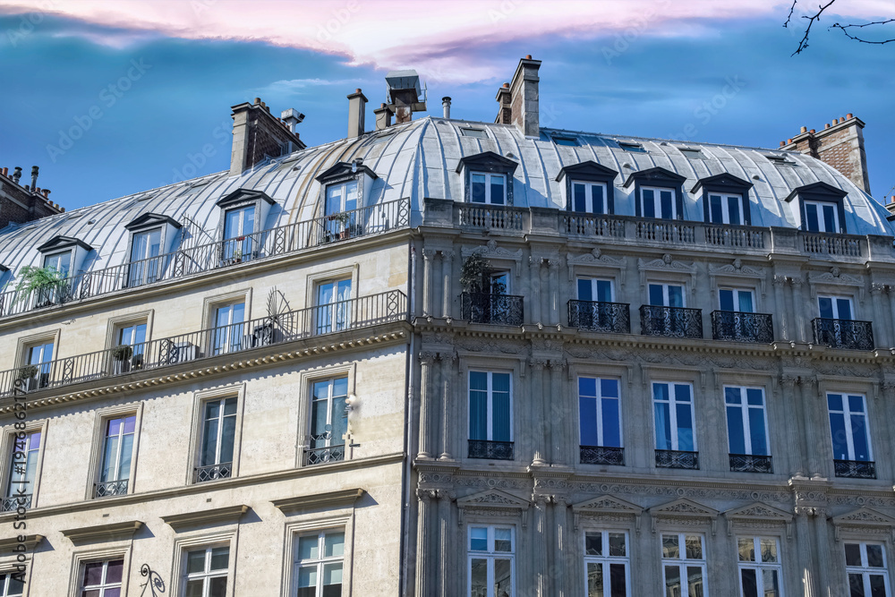 Fototapeta premium Paris, typical building, parisian facade rue de Rivoli, view from the Tuileries garden