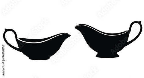 Two black sauce boats presented side by side a striking silhouette