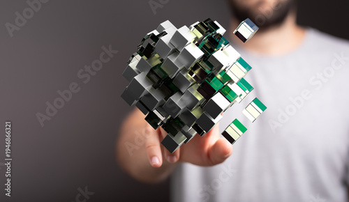 A person touching a 3D cube...