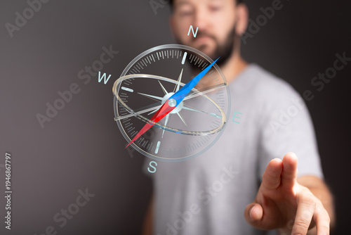 A man using a digital compa...