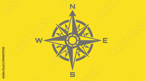 Compass Rose Navigation Tool on Yellow Background for Direction.