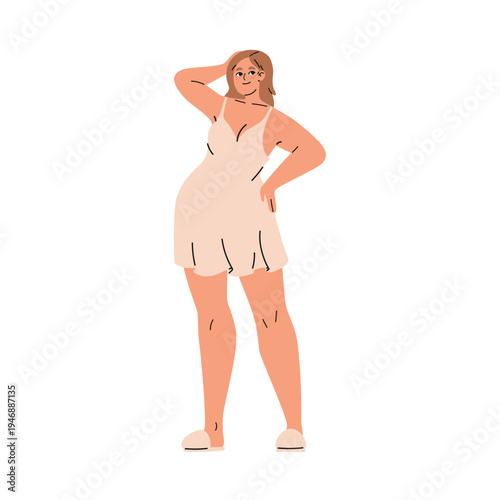 Plus size woman in pajamas standing