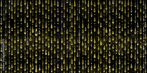 Golden droplets cascade down a dark textured background creating a visual effect