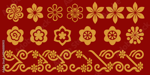 A collection of ornate golden floral and wave like design elements
