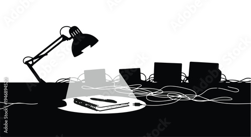 cluttered office desk with computer cables and lamp