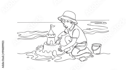 A joyful child in a hat enthusiastically builds a sandcastle on the beach with a bucket and spade, evoking summer fun and childhood innocence.