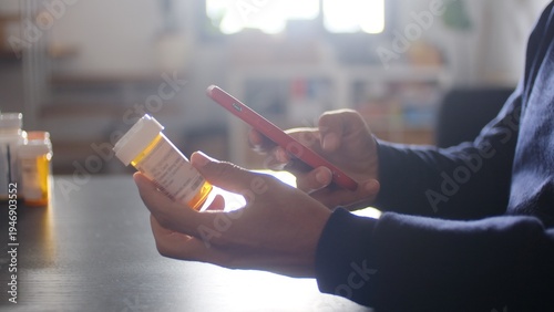 Принти на полотні Person using smartphone for healthcare management, scanning prescription medicin