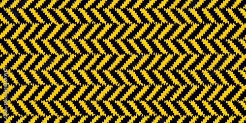 A striking optical illusion featuring repeating yellow and black zigzag patterns
