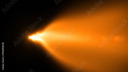 Abstract orange light beam lens flare effect