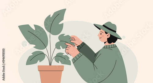 Person in hat caring for a potted plant with large green leaves