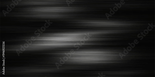 A dark brushed metal texture background with a gray stainless steel pattern and shiny silver aluminum surface for an industrial metallic wallpaper design