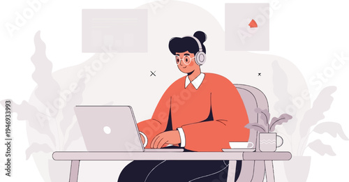 Person wearing headphones works on laptop at desk, with plants and screens in background