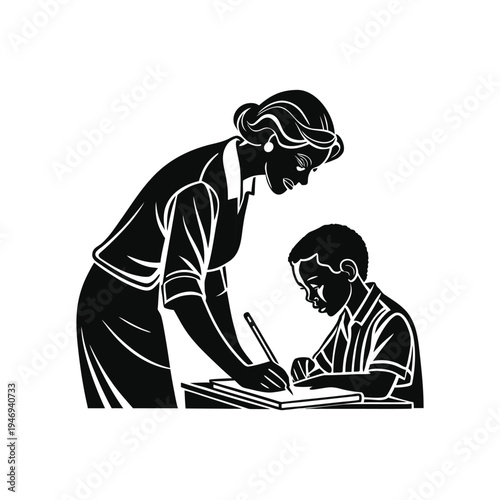 Teacher carefully assisting a young student in writing on a piece of paper during a learning activity