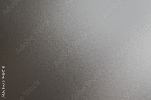 Cuadro en lienzo A grayscale image featuring a textured surface transitioning from dark on the le