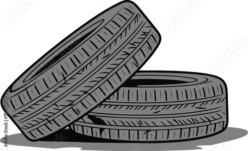 Two gray vehicle tires stacked, one leaning on the other, displaying distinct tread patterns