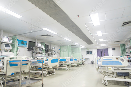 Tableau sur toile Modern hospital ward with empty beds medical equipment healthcare facility clean
