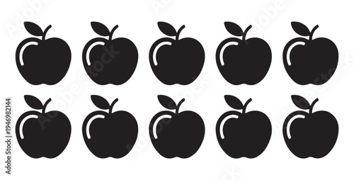 Black apple silhouettes with highlight details set for modern fruit logo design and fresh food iconography
