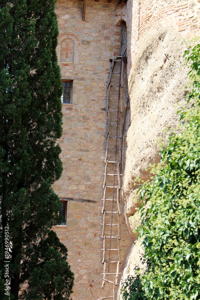Fototapeta premium Meteora Rousanou Monastery Rope Ladder August 2024 Ancient wooden ladder on stone wall