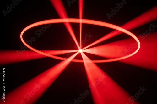 Red Laser Ring and Radiant Rays on Black Background