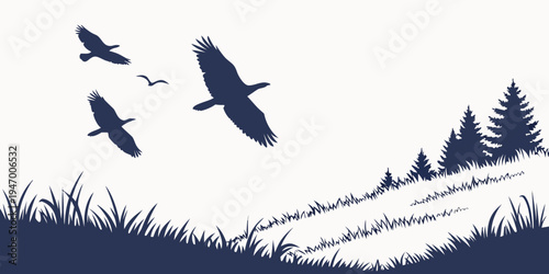 Silhouette of birds flying over grassy hill with trees on right