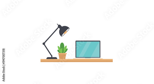 Desk lamp beside computer and plant.