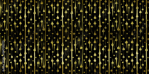 Abstract background of golden droplets falling on a black surface