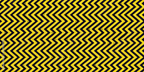 Cautionary black and yellow chevron pattern resembling hazard tape