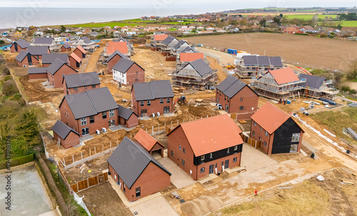 Fotografie Aerial view of a new housing estate being built near the coast in North Norfolk,